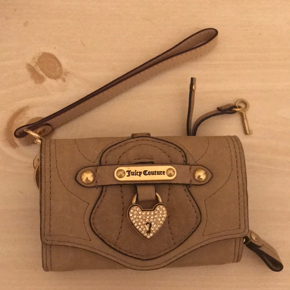 Brand new Juicy Couture wristlet/wallet.